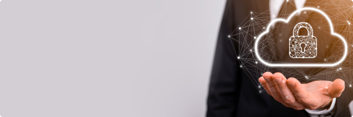 A man in a suit holding an illustrated cloud with a lock in the middle representing delivered cloud security operations